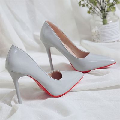 Becmella elegant gray high heel shoes with red bottom pumps for women on white fabric background